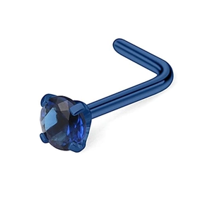 Macro detail of blue L-shaped nose stud with four-prong set sparkling blue zircon gemstone
