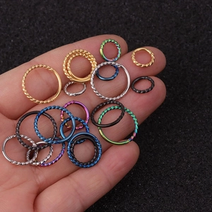 Twisted stainless steel seamless hoop rings for nose and ear piercing in various colors