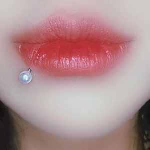 Classic stainless steel lip piercing ring with a white pearl stud for daily body jewelry