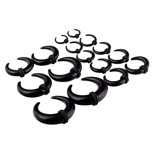 Set of black acrylic crescent ear stretchers in various sizes with rubber O-rings