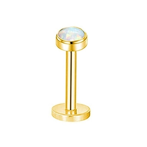 Dettaglio di labret in acciaio dorato con inserto di pietra opale tonda iridescente
