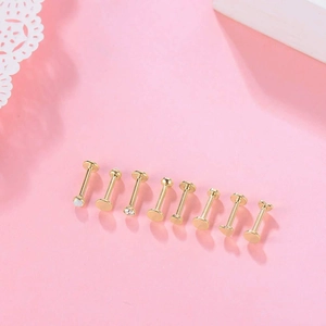 Set di 8 piercing labret in oro e acciaio con cuore di opale e dettagli in cristallo