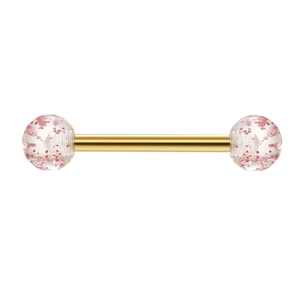 Détail d'un piercing en acier inoxydable doré avec boules à paillettes roses pour la langue