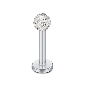 Macro detail of stainless steel labret stud with crystal pavé ball and flat disc base