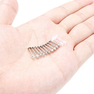 Set of 12 stainless steel labret studs with cubic zirconia and polished beads in hand