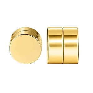 Macro view of gold magnetic stud earrings with polished mirror finish for non-pierced ears
