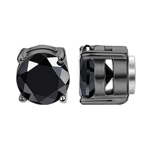 Detail of black faceted magnetic stud earrings with four-prong setting on white background