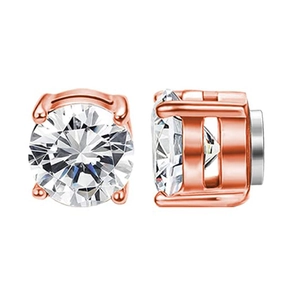 Macro view of rose gold magnetic stud earrings with clear round-cut cubic zirconia crystals