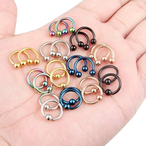 Set de 24 aros de nariz tipo herradura en acero inoxidable de colores con cierre de bola