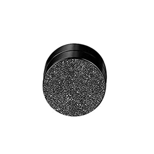Macro detail of round magnetic earring featuring a textured grey sand blast finish and black base