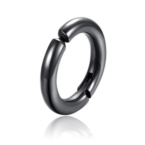 Polished black stainless steel hoop earring detail with mirror reflection on white base
