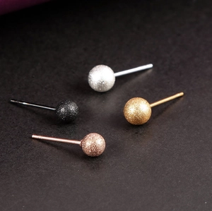 Polished stainless steel ball earrings with sandblasted glitter finish in four colors