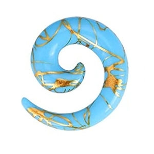 Detailed close-up of blue acrylic spiral ear taper with elegant gold foil patterns
