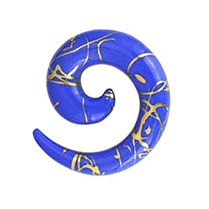 Close-up of blue acrylic spiral ear taper with golden marble texture on white background