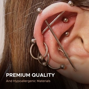 Set de piercing de 36 piezas en acero dorado con varios estilos de aretes para piel sensible