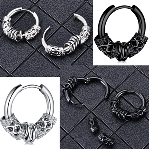 Punk style stainless steel hoop earring set with skull relief in silver and black finish