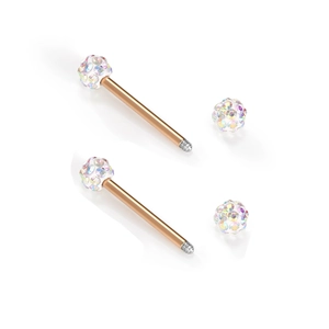 Roségoldene Zungenpiercings mit glitzernden AB-Kristall-Shamballa-Kugeln auf Stahlstäben