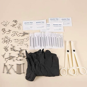 Kit de piercing profesional de 140 piezas en acero inoxidable con herramientas y joyas