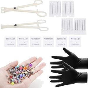 Kit de piercing 120 piezas de acero inoxidable con joyas agujas pinzas y guantes