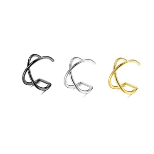 Detailed view of criss-cross ear cuffs in polished black, silver, and gold finishes