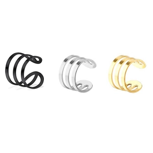 Detailed view of three-layered ear cuffs in black, silver, and gold stainless steel
