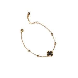 Elegant 18K gold plated stainless steel bracelet with black clover and crystal charms