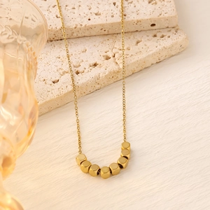 Minimalist 18K gold plated titanium steel necklace featuring seven square cube pendants