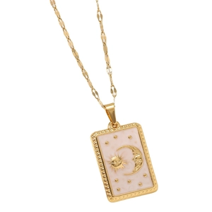 Golden tarot style sun and moon pendant necklace on minimalist polished chain