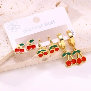 Three-pair gold stainless steel cherry earring set featuring studs and hoops with red enamel