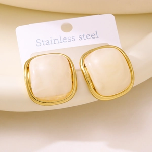 Elegant gold stainless steel square stud earrings with marble resin inlay on white display