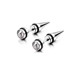 Macro shot of silver stainless steel spike earrings with rhinestones and black rubber rings