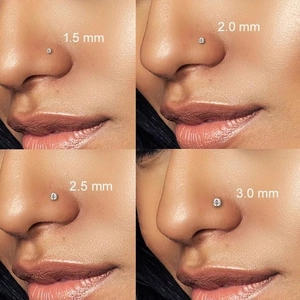 Stainless steel nose stud set showing 1.5mm to 3.0mm diameter sizes on model