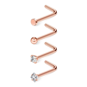 Macro shot of rose gold L-shaped nose studs set with ball, flat disc, round and square CZ