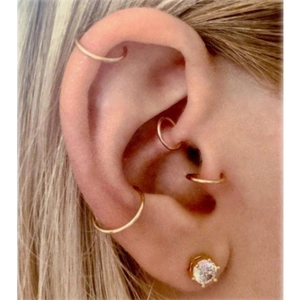 6-piece gold stainless steel hoop earrings and rhinestone stud set shown on model