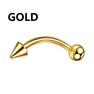 Detail of gold curved barbell jewelry with spike and ball ends in stainless steel
