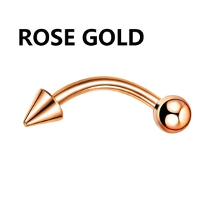 Detailed macro view of rose gold curved barbell jewelry with cone and ball ends