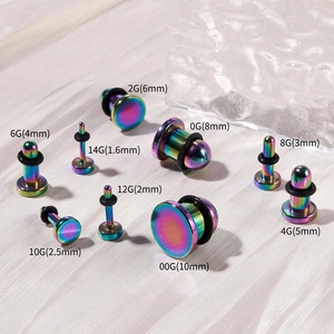 Dettagli kit di espansione orecchio in acciaio arcobaleno da 14G a 00G su raso bianco