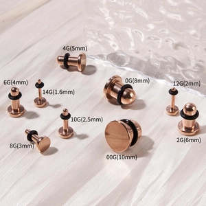 Diverse dimensioni di dilatatori in acciaio inossidabile oro rosa con O-ring neri su seta