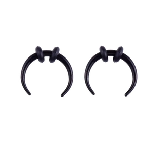 Detail of black stainless steel crescent horn nose rings with rubber O-rings