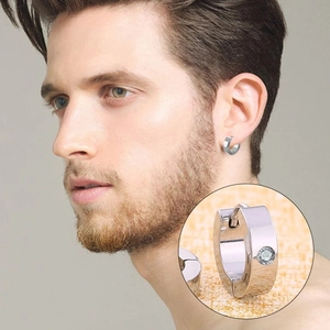 Classic silver stainless steel huggie hoop earring for men with a single cubic zirconia stone