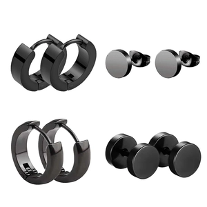 Detail set of four black stainless steel hoop and stud earrings with polished metal finish