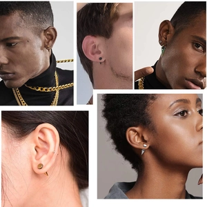 Vue détaillée des boucles d'oreilles cônes en acier inoxydable en or, noir et argent