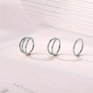 Polished stainless steel hoop set including single, double, and triple layered rings