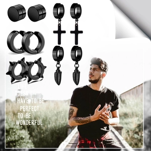 Détails de cinq boucles d'oreilles punk noires en acier avec pendentifs croix et feuille