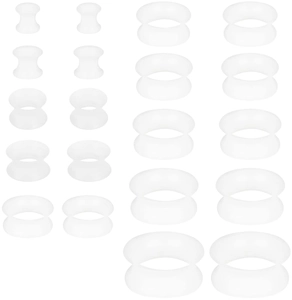 Detailliertes Set aus weißen lichtdurchlässigen Silikon-Ear-Tunnels in elf verschiedenen Größen