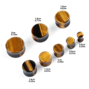 Tiger's eye stone ear plugs set in various sizes from 6mm to 20mm on white background