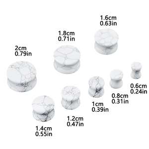 Detailed size guide for white turquoise ear plugs ranging from 6mm up to 20mm diameter