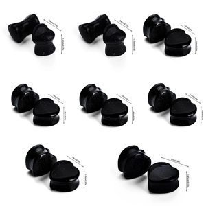 Blue Goldstone heart ear gauges in various sizes from 6mm to 20mm on white background
