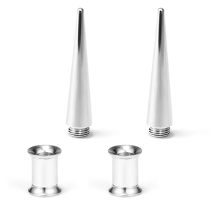 Detailed macro view of high-polished stainless steel ear stretching tapers and tunnel kit