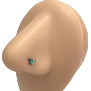 Rainbow butterfly nose stud in stainless steel displayed on a realistic nose model